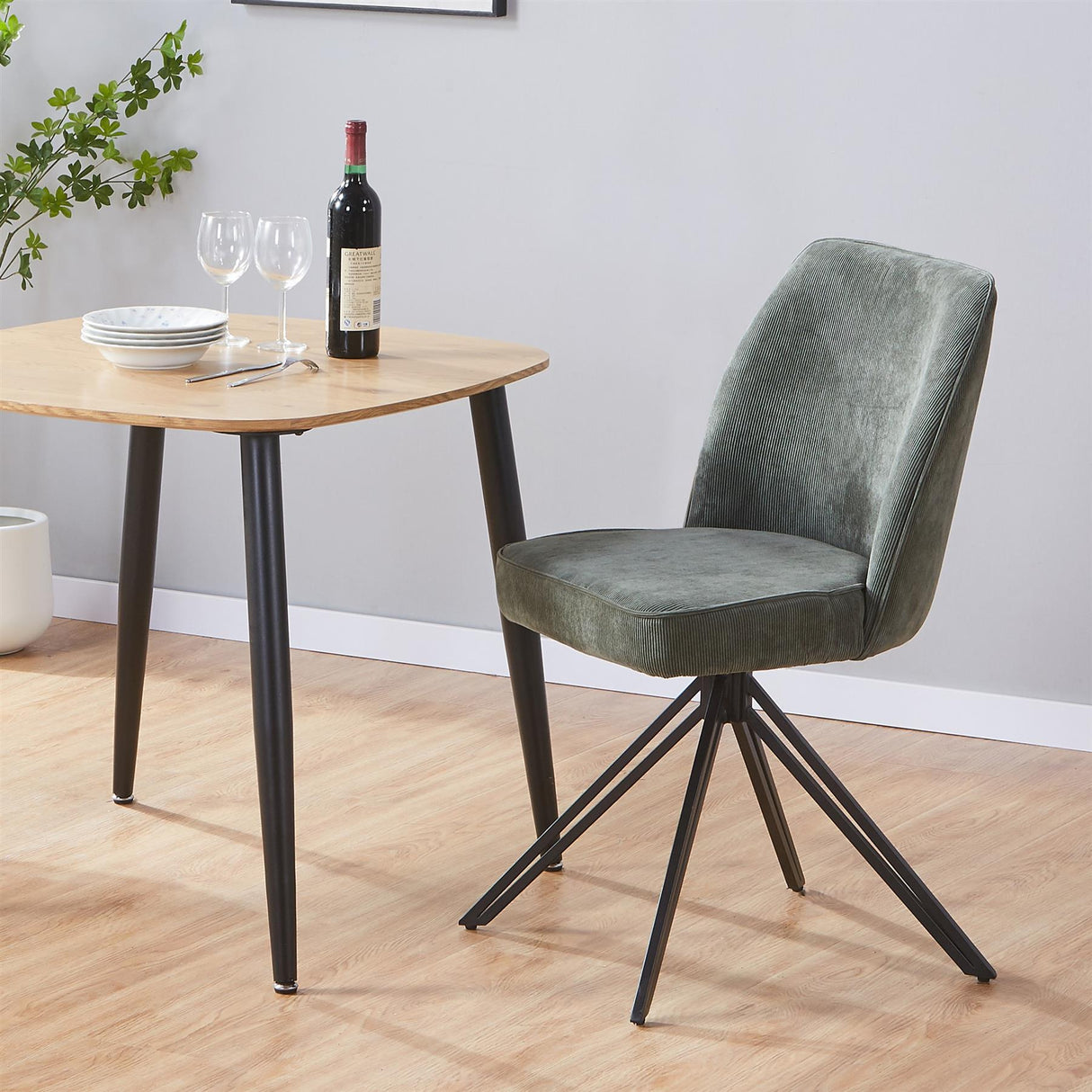 Aspen swivel dining chairs, green cord fabric with black metal legs (pair)