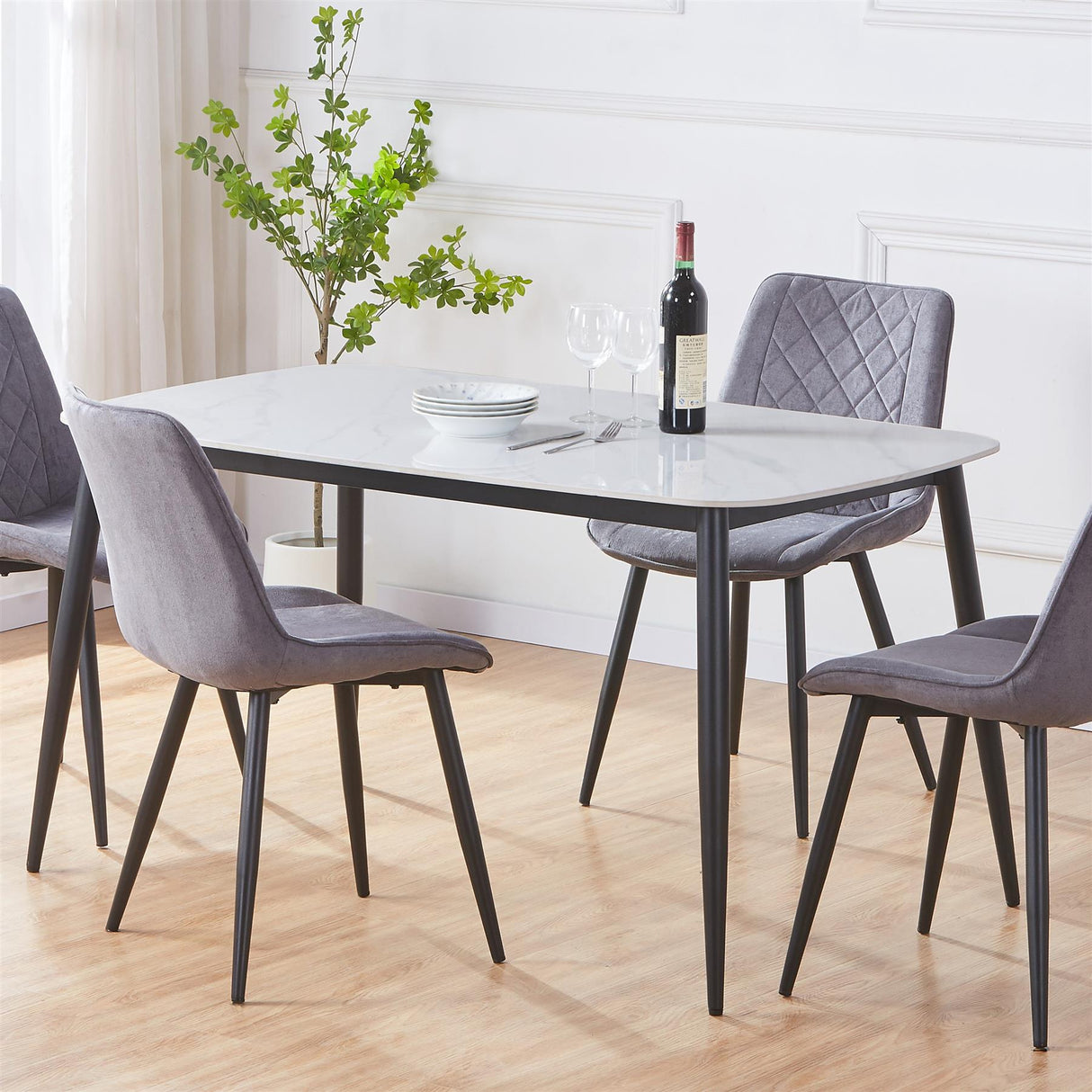 Aspen rectangular dining table, gloss white sintered stone top with black tapered legs